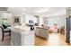 Bright kitchen featuring white cabinets, an island with wood top, and stainless steel appliances at 6420 Longwood Dr., Murrells Inlet, SC 29576