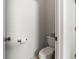A clean and simple half bathroom with toilet and toilet paper holder and tissue box at 6420 Longwood Dr., Murrells Inlet, SC 29576