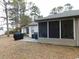 Backyard screened porch of villa, with grill at 6805 Creekwatch Rd. # 105, Myrtle Beach, SC 29588