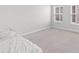 Bright and airy bedroom with soft carpeting and large windows, creating a relaxing and comfortable atmosphere at 720 Little Fawn Way, Myrtle Beach, SC 29579