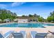 Inviting community pool with sun loungers and a covered pavilion in a tranquil setting at 720 Little Fawn Way, Myrtle Beach, SC 29579