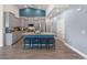 Open kitchen boasts granite countertops, stainless appliances, an island with seating, and ample cabinet space at 720 Little Fawn Way, Myrtle Beach, SC 29579