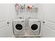 Bright laundry room features a shelf with laundry detergent and two LG washing machines at 720 Little Fawn Way, Myrtle Beach, SC 29579
