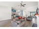 Open-concept living space featuring vaulted ceilings, a fireplace, and bright natural light at 720 Little Fawn Way, Myrtle Beach, SC 29579