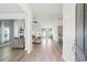Bright, open-concept living spaces featuring wood floors and a seamless flow into the kitchen at 720 Little Fawn Way, Myrtle Beach, SC 29579