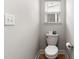 Efficient powder room with neutral tones and a window for natural light to keep it bright and airy at 720 Little Fawn Way, Myrtle Beach, SC 29579