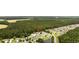 Aerial view of neighborhood highlighting home amongst lush, mature trees and landscaping at 721 Dunlon Ct., Myrtle Beach, SC 29588