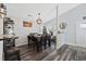 Elegant dining room with a chandelier, ample seating, and a view into the kitchen at 721 Dunlon Ct., Myrtle Beach, SC 29588