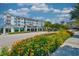 Commercial area with street-side flowers enhancing the charm of the buildings at 750 Shine Ave. # 750, Myrtle Beach, SC 29577