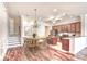 View of the dining area and the modern kitchen in this home at 750 Shine Ave. # 750, Myrtle Beach, SC 29577