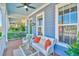 Inviting front porch with cozy seating, stylish decor, and a relaxing ambiance at 750 Shine Ave. # 750, Myrtle Beach, SC 29577