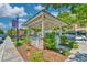 Quaint gazebo with stone accents is nestled among beautiful landscaping and greenery at 750 Shine Ave. # 750, Myrtle Beach, SC 29577