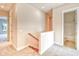 View of a hallway with carpet, doors and a staircase at 750 Shine Ave. # 750, Myrtle Beach, SC 29577