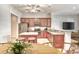 Cozy kitchen with stainless appliances, granite countertops, a kitchen island and a breakfast bar at 750 Shine Ave. # 750, Myrtle Beach, SC 29577