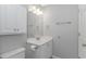 A clean bathroom with a vanity, sink, and toilet at 751 Painted Bunting Dr. # E, Murrells Inlet, SC 29576