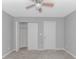A bright bedroom with a closet at 751 Painted Bunting Dr. # E, Murrells Inlet, SC 29576