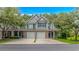 Charming townhome with attached two-car garage, inviting entrance and manicured front lawn at 751 Painted Bunting Dr. # E, Murrells Inlet, SC 29576