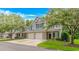 Inviting townhome with a two-car garage, green shutters and a manicured lawn at 751 Painted Bunting Dr. # E, Murrells Inlet, SC 29576