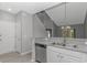 Spacious kitchen featuring modern dishwasher, sink, and gray countertops in an open-concept layout at 751 Painted Bunting Dr. # E, Murrells Inlet, SC 29576