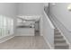 Living area showing kitchen with breakfast bar, lighting and stairway at 751 Painted Bunting Dr. # E, Murrells Inlet, SC 29576