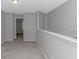 Cozy loft area with neutral carpet and grey walls at 751 Painted Bunting Dr. # E, Murrells Inlet, SC 29576