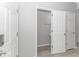 Powder room featuring updated paint and flooring, and a toilet around the corner at 751 Painted Bunting Dr. # E, Murrells Inlet, SC 29576