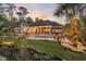 Beautiful backyard with a black metal fence surrounding a sparkling pool and furnished outdoor seating area at 81 Cascade Dr., Murrells Inlet, SC 29576
