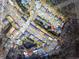 Aerial view of a well-planned residential community with tree-lined streets at 8151 Woodland Dr., Myrtle Beach, SC 29588