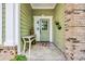 Inviting front door with decorative accents and a charming welcome mat at 840 Jeter Ln., Myrtle Beach, SC 29588