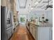 Modern kitchen with stainless appliances, granite counters, and an open layout to the living area at 840 Jeter Ln., Myrtle Beach, SC 29588