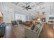 Inviting living room featuring hardwood floors, coffered ceilings, and abundant natural light at 840 Jeter Ln., Myrtle Beach, SC 29588