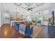 Spacious living room with a seamless flow to kitchen, coffered ceilings, and large windows at 840 Jeter Ln., Myrtle Beach, SC 29588