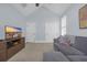 Cozy living room with vaulted ceilings, ample seating, and a modern entertainment center at 840 Jeter Ln., Myrtle Beach, SC 29588