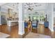 Bright and airy living space with high ceilings, large windows, and seamless kitchen access at 840 Jeter Ln., Myrtle Beach, SC 29588