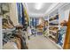 Well-organized walk-in closet with hanging racks and shelving at 840 Jeter Ln., Myrtle Beach, SC 29588