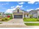 Charming single Gathering home featuring a two-car garage and a well manicured lawn at 8469 Cape Dutch Loop, Myrtle Beach, SC 29572