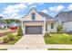 Charming single Gathering home featuring a two-car garage and a well manicured lawn at 8469 Cape Dutch Loop, Myrtle Beach, SC 29572