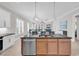 Open-concept kitchen featuring stainless steel appliances, granite countertops, and lots of cabinet space at 8469 Cape Dutch Loop, Myrtle Beach, SC 29572