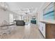 The living room features wood floors, a decorative ceiling, and tons of natural light at 8469 Cape Dutch Loop, Myrtle Beach, SC 29572