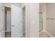 Bright bathroom featuring a clear shower and linen closet at 908 Wrigley Dr. # 17-3_17-3G, Myrtle Beach, SC 29588
