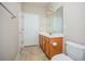 Bright bathroom featuring a single sink vanity, tile floors, and a large mirror at 908 Wrigley Dr. # 17-3_17-3G, Myrtle Beach, SC 29588