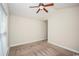 Bright bedroom with a ceiling fan, carpet flooring, and a large window at 908 Wrigley Dr. # 17-3_17-3G, Myrtle Beach, SC 29588