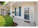 Charming entrance featuring a 'hello' mat and blue shutters at 908 Wrigley Dr. # 17-3_17-3G, Myrtle Beach, SC 29588