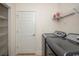 Laundry room with modern washer and dryer, shelving, and a convenient layout at 908 Wrigley Dr. # 17-3_17-3G, Myrtle Beach, SC 29588