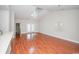 A living room with a vaulted ceiling, fan, and wood floors at 908 Wrigley Dr. # 17-3_17-3G, Myrtle Beach, SC 29588