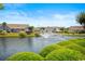 Community pond with a fountain, and surrounding landscaping at 908 Wrigley Dr. # 17-3_17-3G, Myrtle Beach, SC 29588