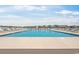 Community pool with clear blue water, surrounded by lounge chairs at 908 Wrigley Dr. # 17-3_17-3G, Myrtle Beach, SC 29588