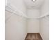 Spacious walk-in closet with wire shelving and carpet flooring at 908 Wrigley Dr. # 17-3_17-3G, Myrtle Beach, SC 29588