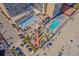 Aerial view showcasing pools, bar and outdoor dining areas, and beach access at 9550 Shore Dr. # 529, Myrtle Beach, SC 29572