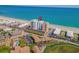 Aerial view of a condo complex with ocean access, ample parking, and nearby neighborhood at 9550 Shore Dr. # 529, Myrtle Beach, SC 29572